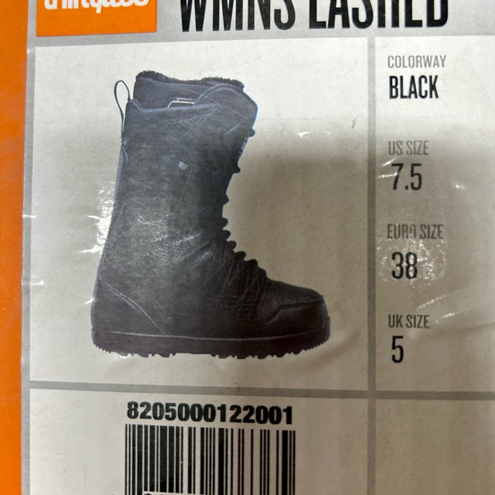 Thirty-two snowboarding boots